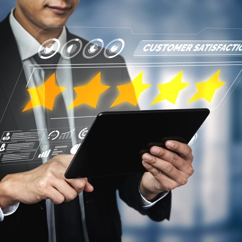 Customer review satisfaction feedback survey concept. User give rating to service experience on online application. Customer can evaluate quality of service leading to reputation ranking of business.